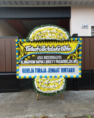 Papan Bunga Duka di Slerok